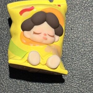 Cute Yellow Sleeping Character Keychain bean toy.